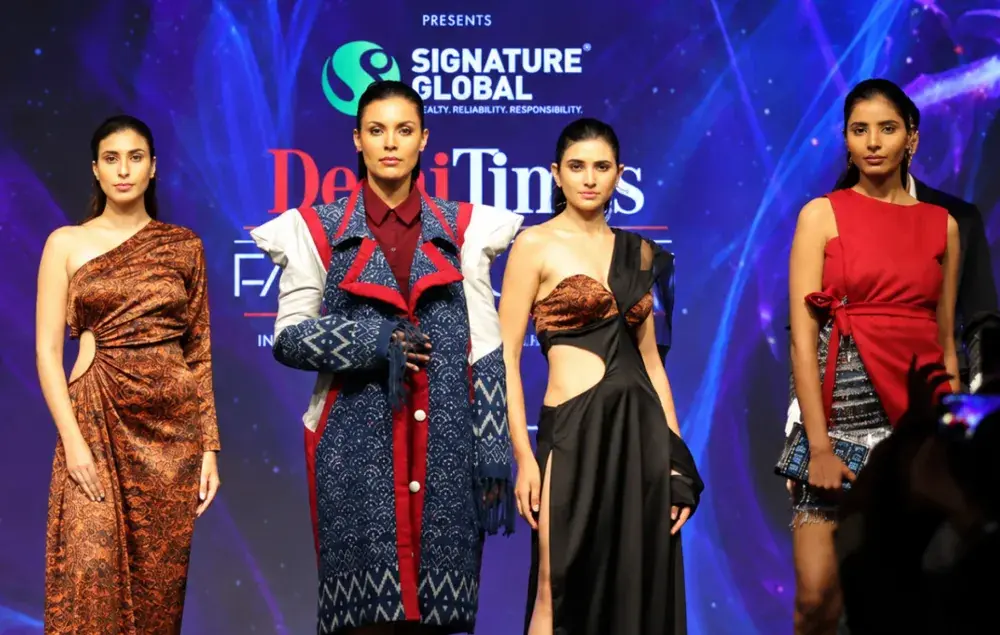 Fashion models presenting designer collection at KRMU fashion show